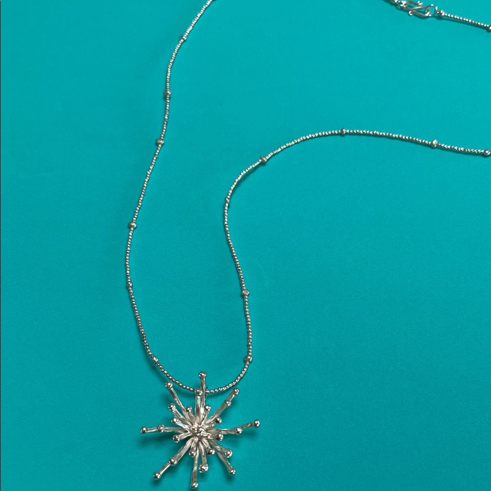 Elegant Silver Starburst Necklace